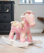 Pink paisley print rocking horse with white rockers