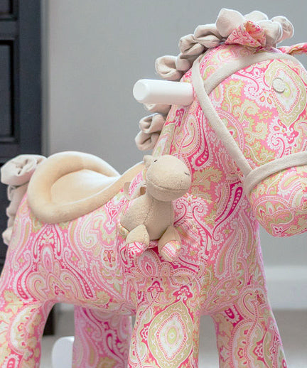 Close up of pink rocking horse