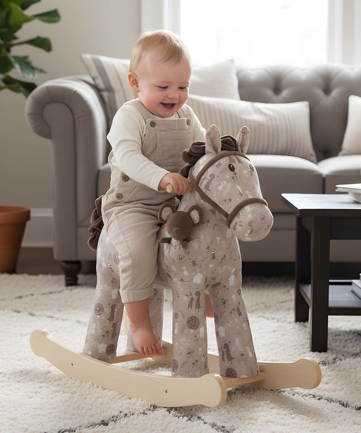 Plush baby rocking horse toy with wooden rockers and friendly face