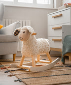 Cream plush rocking sheep with wooden rocker frame and plaid ear patch detail.