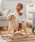 Cream plush rocking sheep toy with wooden rocker base and plaid ears