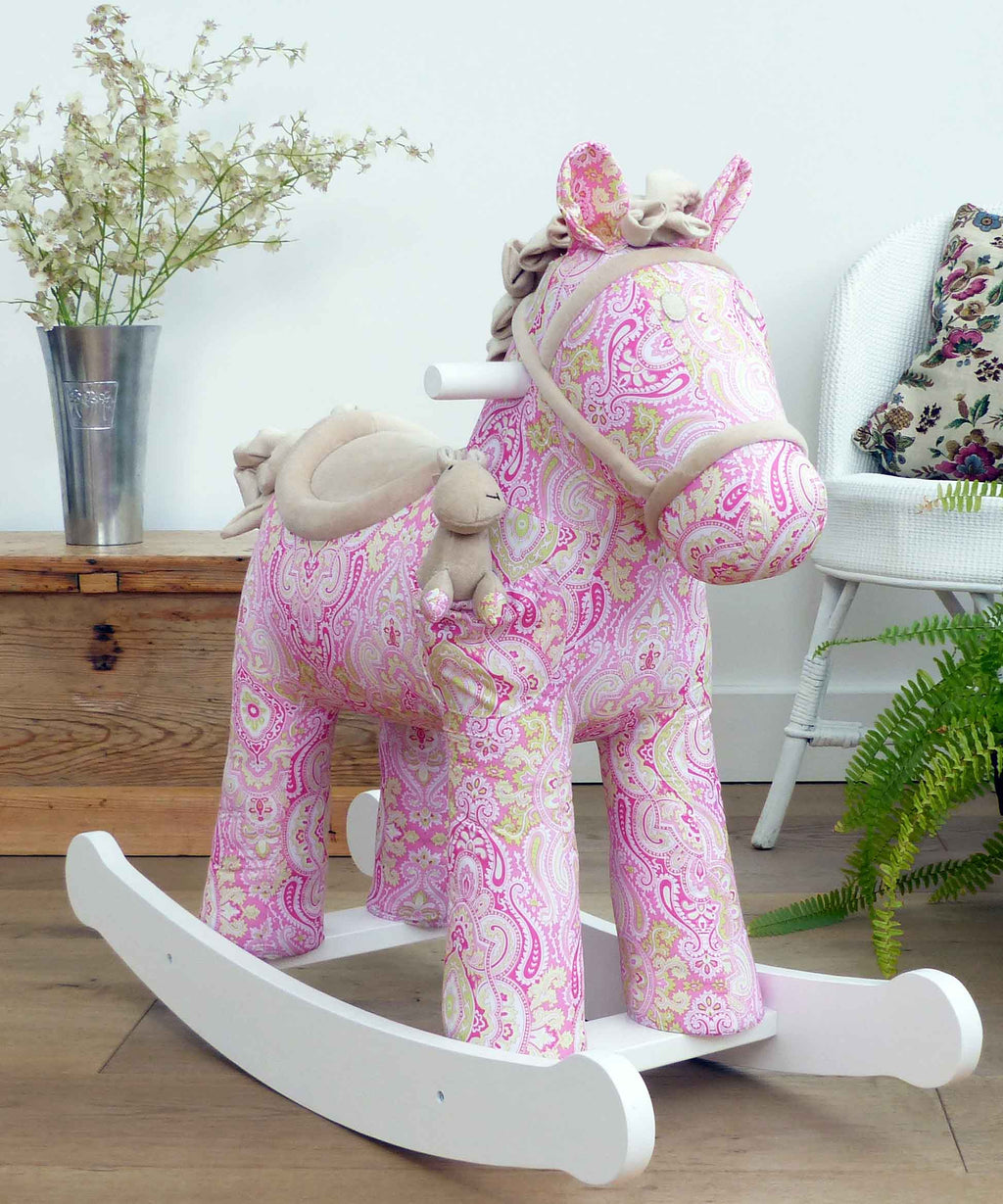 Pink paisley plush rocking horse with white wooden rockers