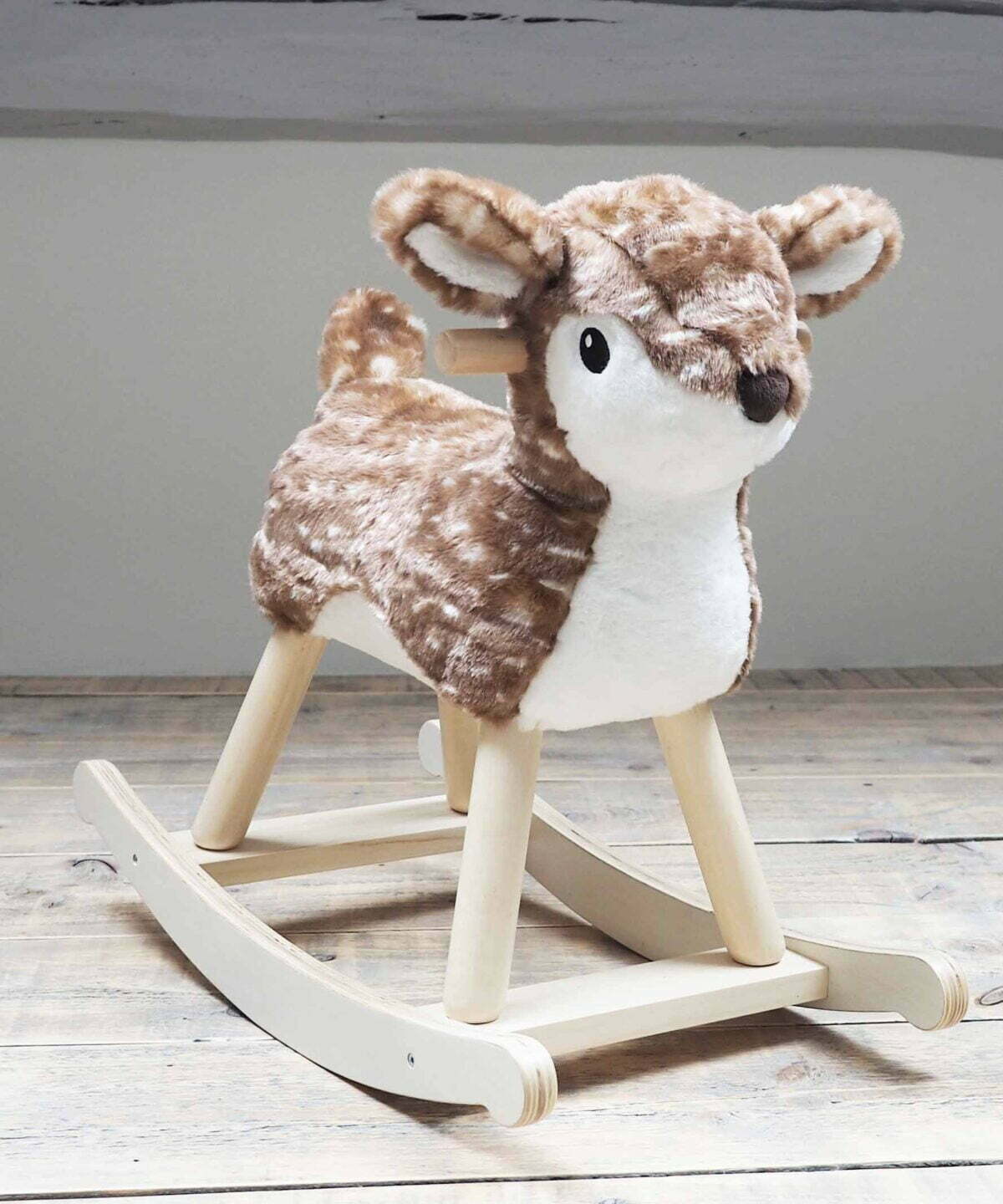Willow Rocking Deer with freckled plush fur and wooden legs