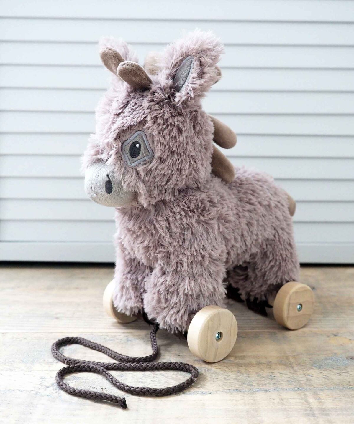 Norbert Donkey Pull Along Toy with big ears and fluffy brown fabric