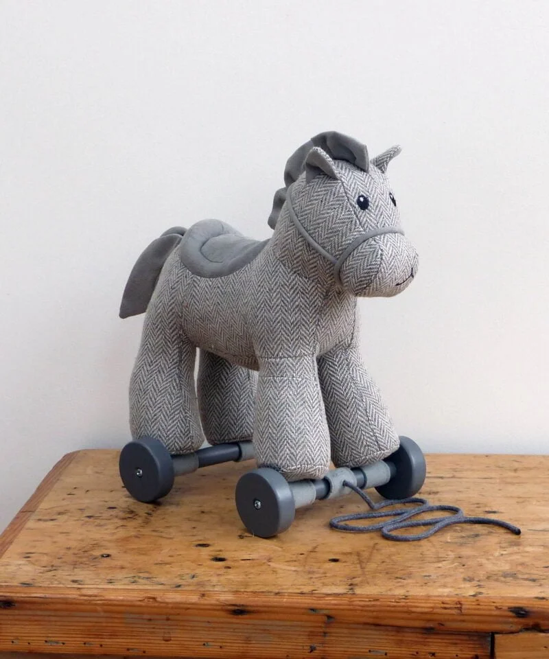 Stirling Horse Pull Along Toy with luxurious grey herringbone fabric and removable wheels