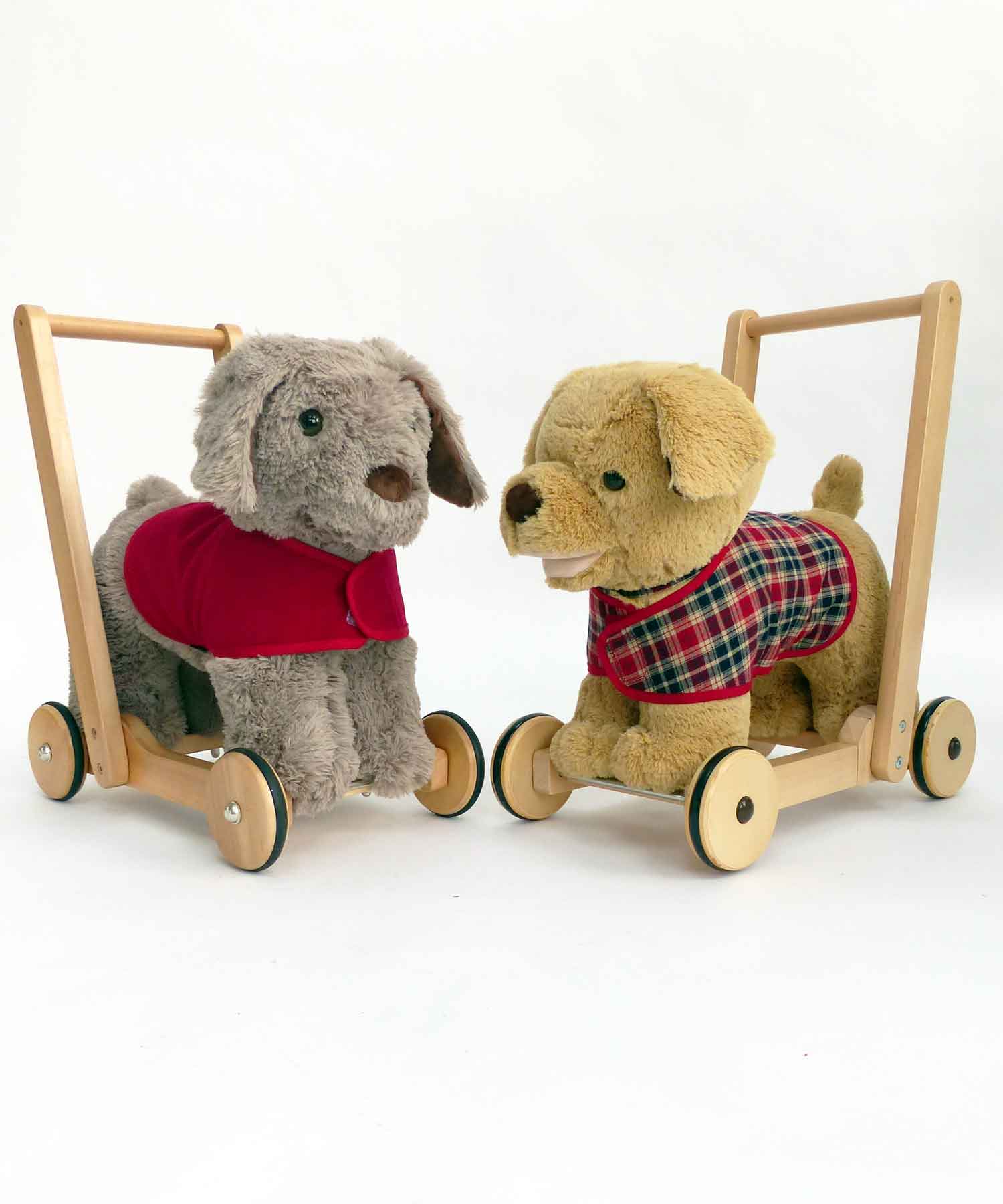 Two baby walkers wearing bespoke fitted dog outfits