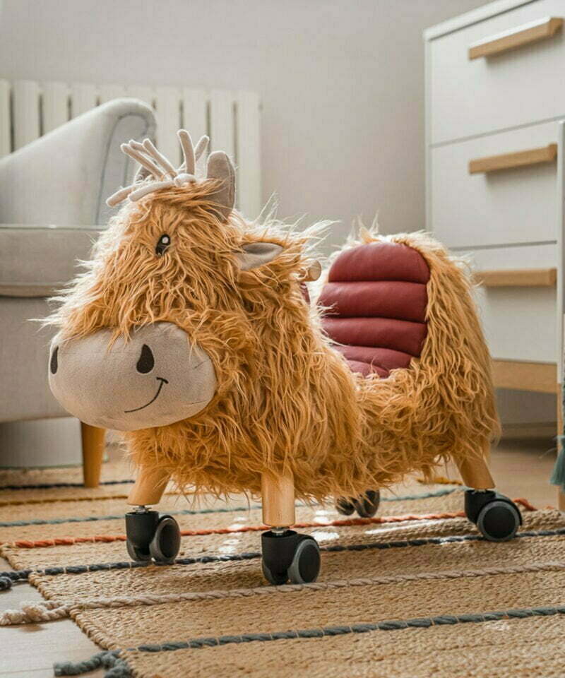 Hubert highland cow ride on in nursery room 